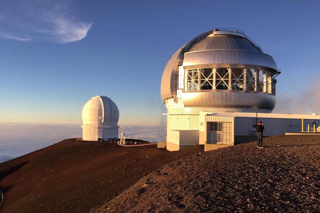 Observatoire au coucher de soleil - Odyssée américaine Big Island est renommée pour l’observation astronomique. Si vous souhaitez une expérience encore plus immersive, participez à une randonnée nocturne organisée pour observer le ciel étoilé